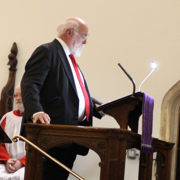 The Lord Lisvane, our Honorary Vice President, giving a reading.